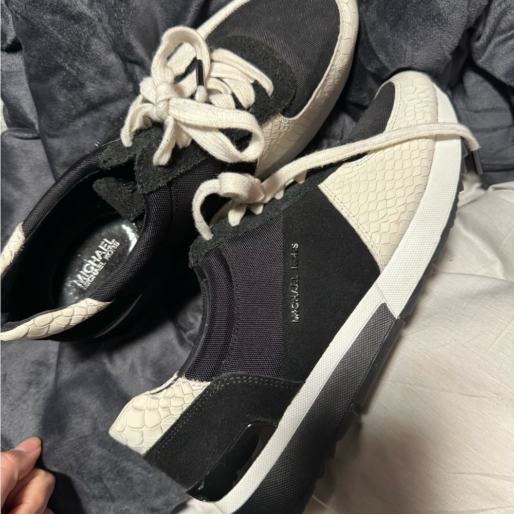 Michael Kors tennis shoes.